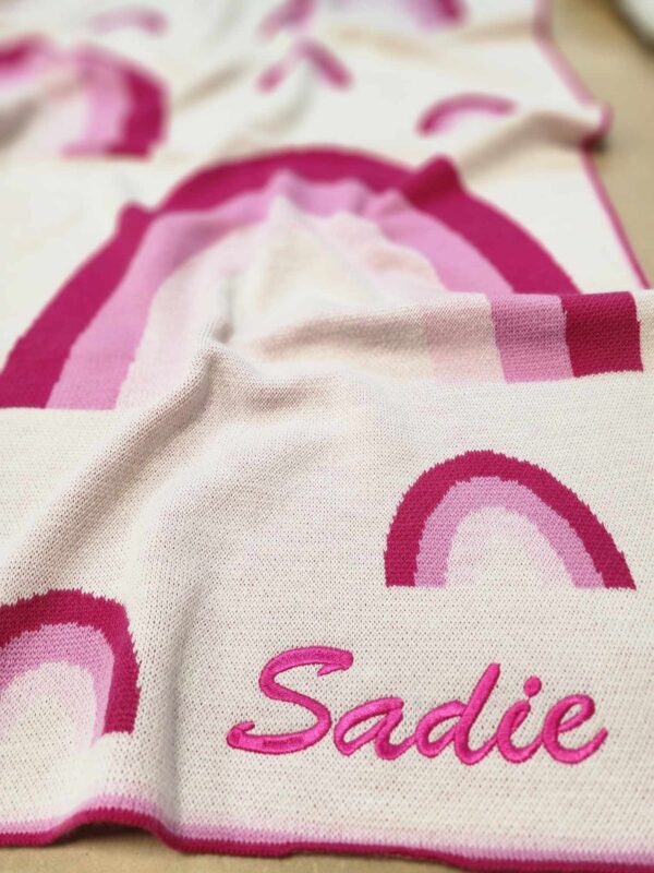 Branberry, Australian Made, Australian Merino Wool Pink Rainbow Blanket with a pink Personalised name embroidery.