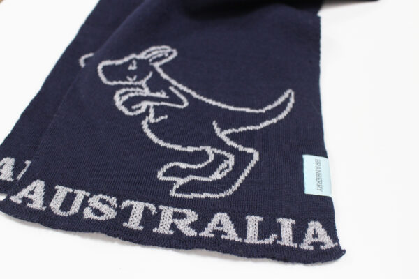 Close-up of knitted kangaroo and 'Australia' detail on the Australian Merino Wool Scarf.